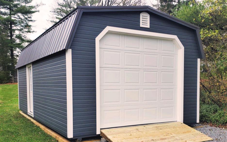 detached garage with paneled garage door